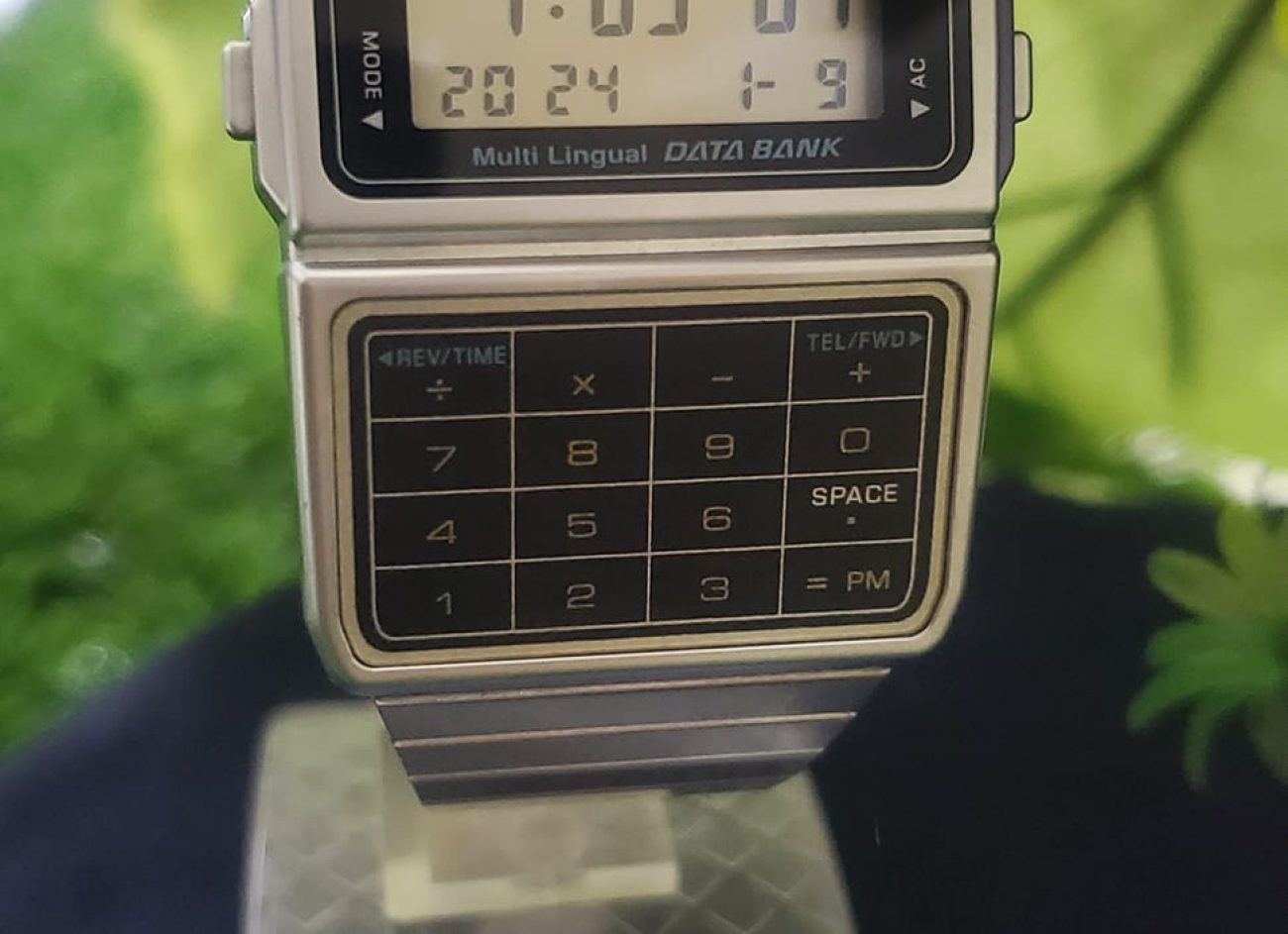 Casio Men's Silver Tone 25 Memory Calculator Databank Watch in Basic Office Calculators by Casio